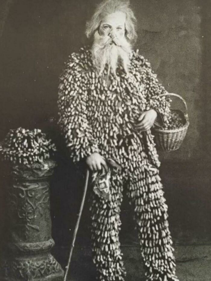 A Peanut Vendor Wearing A Suit Made Of Peanuts [1890]
