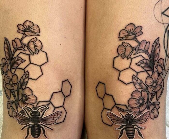Bee and floral knee tattoos with hexagon patterns, showcasing unique tattoo designs.