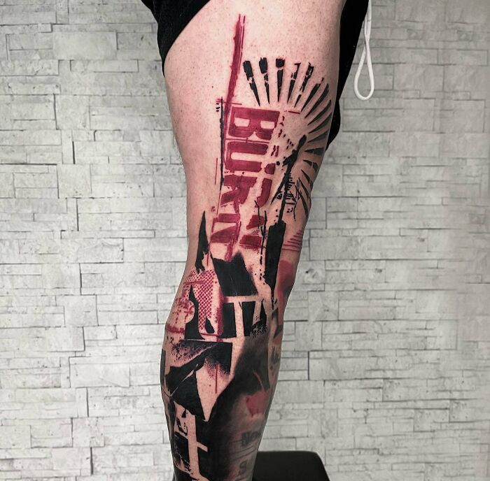 Leg with a detailed Trash Polka tattoo design featuring red and black abstract elements against a light background.