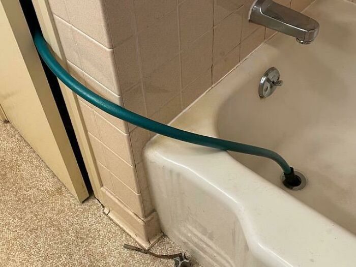 Plumber Can't Fix Our Tub Drain Until Monday. But The Downstairs Drain Works, And The Laundry Chute's Right There. . . Turns Out A 3/4" Garden Hose Siphons Water Out At The Same Rate Our Shower Head Puts It In!