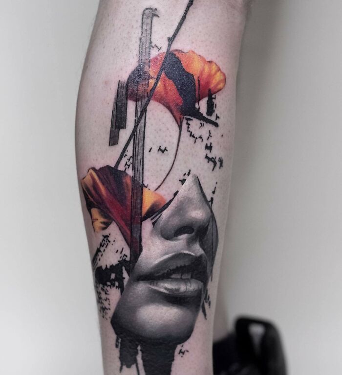 Trash Polka tattoo design on a leg, featuring a woman's face and abstract elements in red and black.