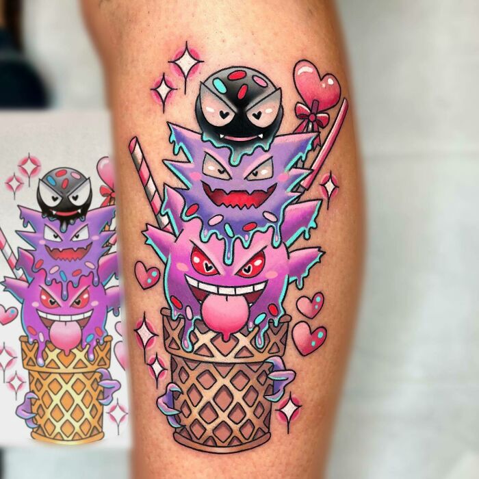 Anime tattoo featuring vibrant ghostly creatures in an ice cream cone design with hearts and sparkles.