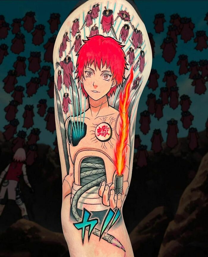 Vibrant anime tattoo showcasing a fiery red-haired character with intricate details and bold colors.