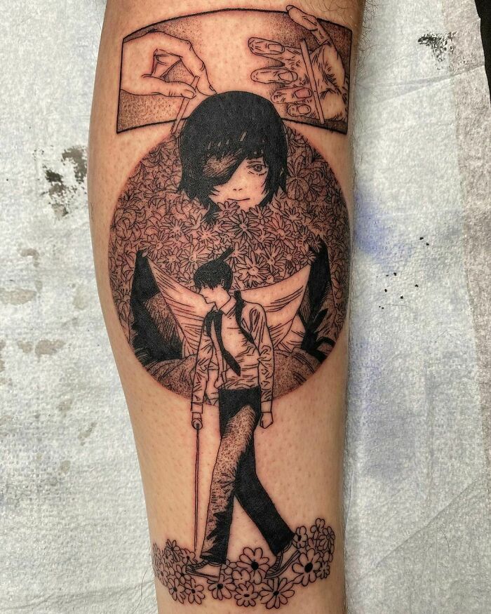 Anime tattoo featuring a stylized character with floral and artistic elements on an arm.