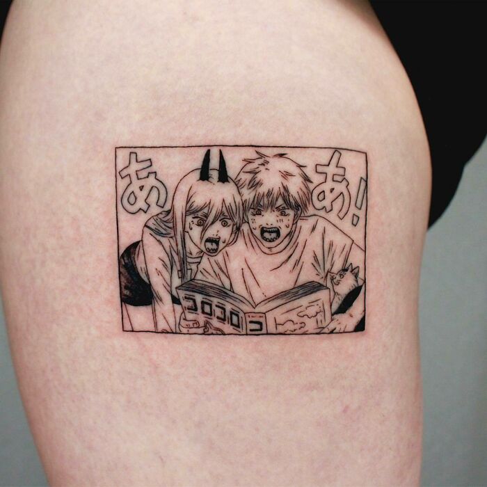 Anime tattoo featuring two surprised characters from a manga panel, showcasing bold black ink artistry.