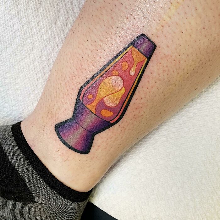 Colorful lava lamp ankle tattoo design showcasing vibrant inkwork.