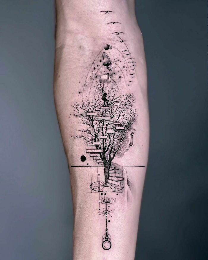 Abstract tree tattoo with cosmic elements on an arm, showcasing the wonders of nature in ink.