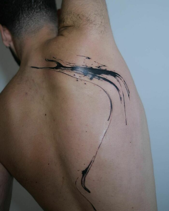 Back tattoo with abstract design by viral tattoo artist.