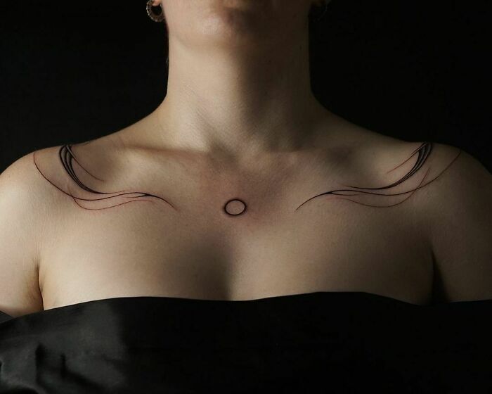 Minimalist collarbone tattoo design with delicate black lines and circle, ideal for men and women seeking elegant body art.