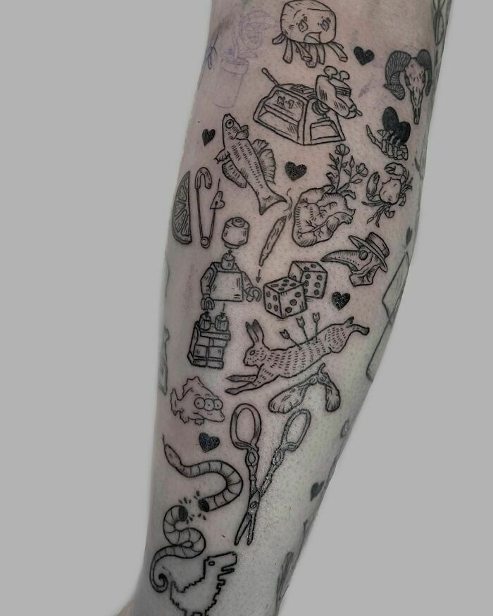 Unique patchwork tattoo design featuring various small, detailed symbols and objects on a person's forearm.