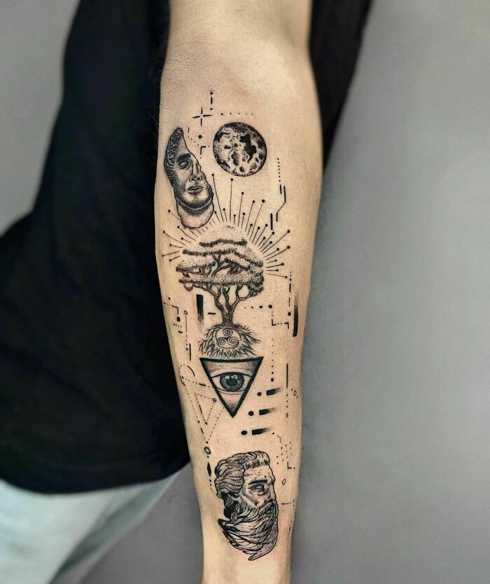 Abstract patchwork tattoo on forearm featuring celestial and nature elements, including a tree and an eye within a triangle.