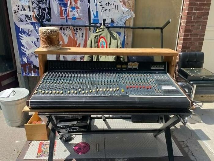 Vintage Soundcraft audio mixing console discarded on NYC sidewalk, showcasing stoop and stare real treasures found outdoors.