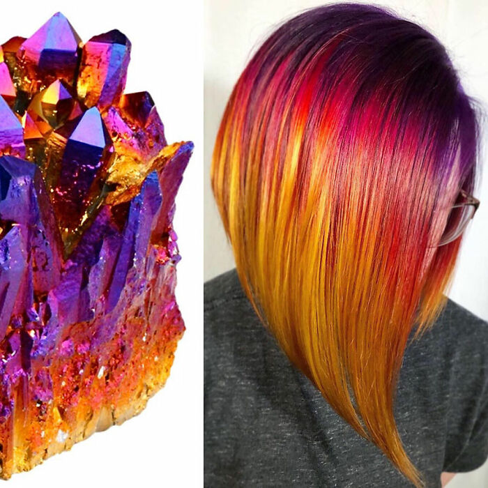 Vibrant multicolor hair design inspired by crystal hues, showcasing bold red, orange, and purple shades by Kansas hairstylist.