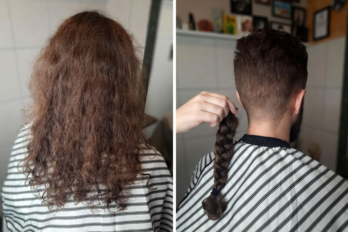 Man showing before and after haircut with long hair cut off for donation, wearing striped shirt in a barbershop.