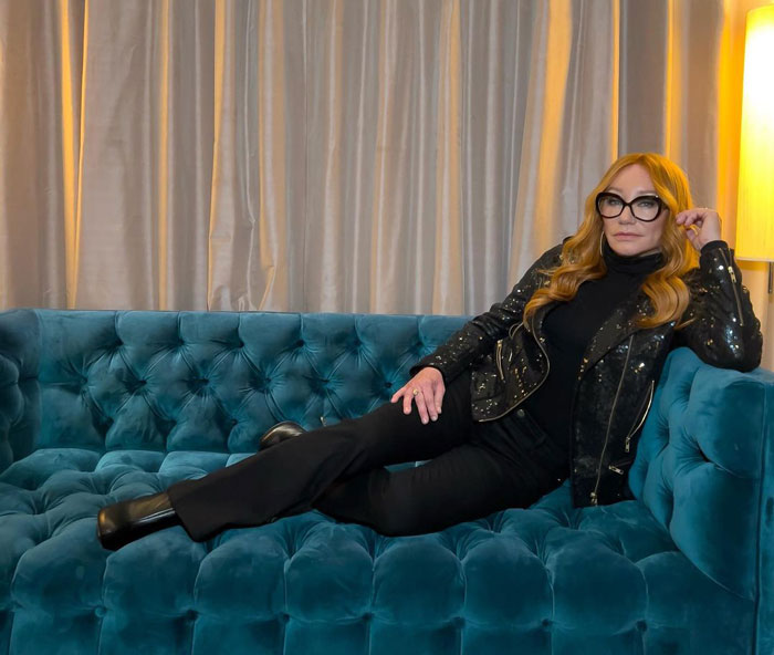 Tori Amos laying on the sofa 