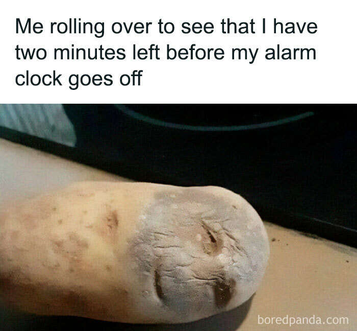 Funny meme of a potato resembling a sleepy face, humorously captioned about feeling tired before the alarm clock rings.