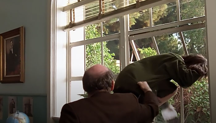 Mr. Hall pulling the student out of the window 