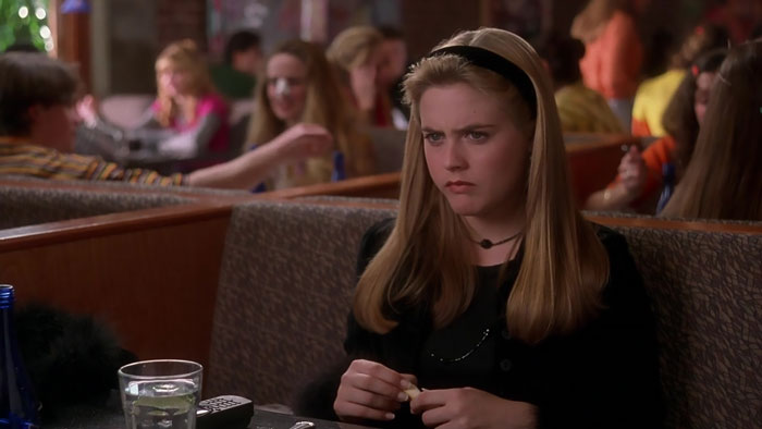 Cher wearing black looks grumpy 