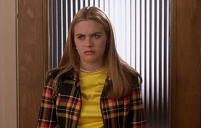 Cher wearing yellow shirt 