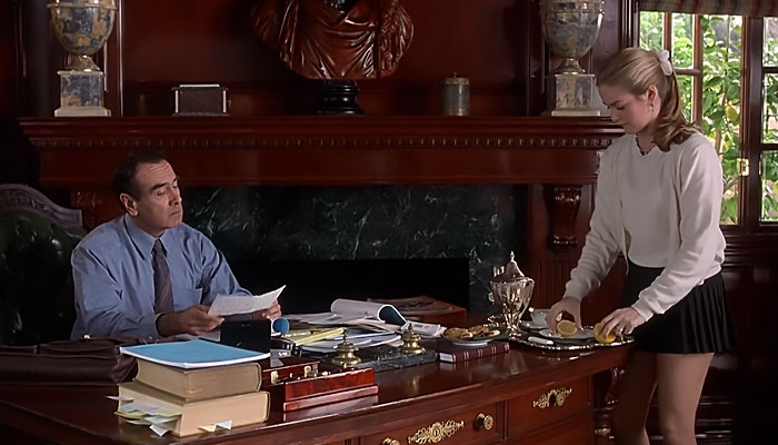 Cher serving tea to Mel 