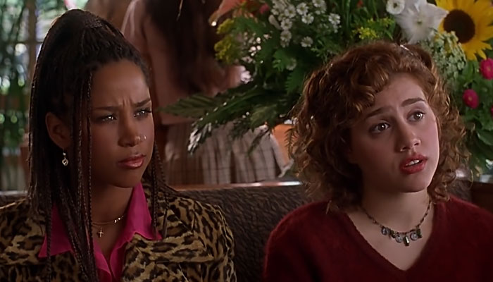 Tai and Dionne on a couch 