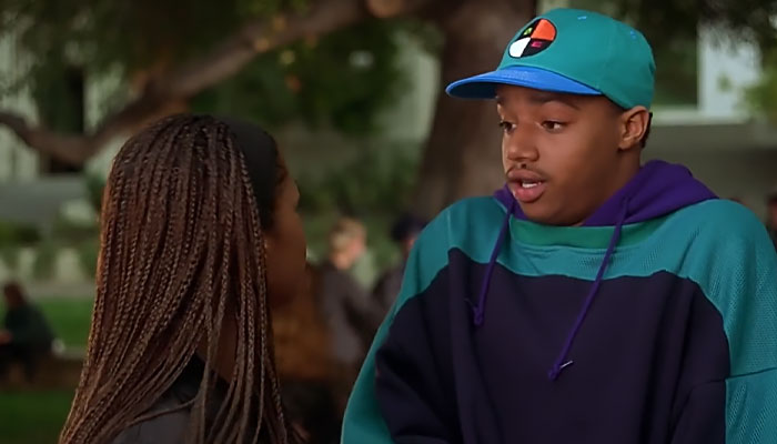 Murray wearing green baseball hat 