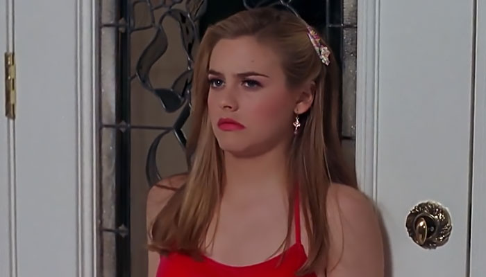 Cher wearing red dress 