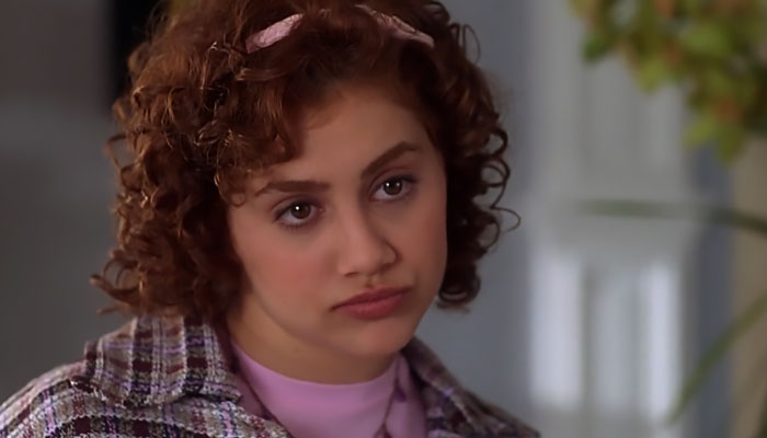 Tai wearing pink shirt 