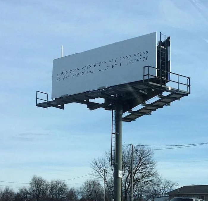 Cursed meme of a blank billboard with a blue sky background, resembling an incomplete message.