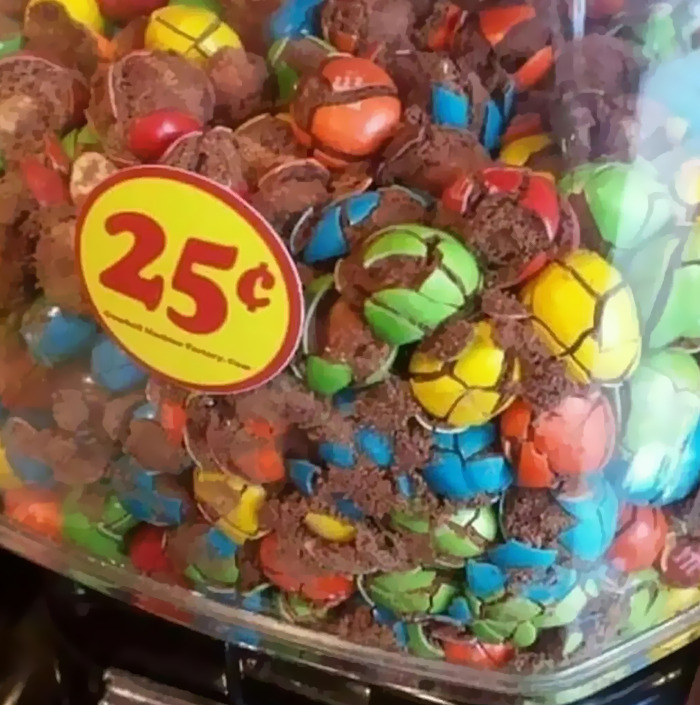 Crushed candies in a jar with a 25-cent label, representing a cursed meme from an IG page.