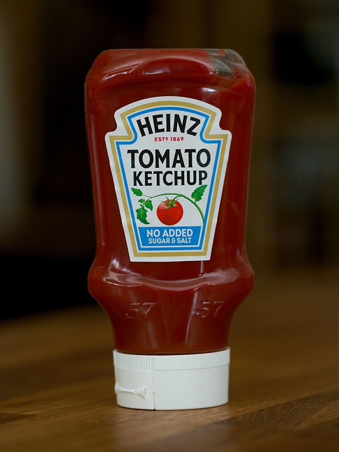 A bottle of Heinz Tomato Ketchup, showcasing a food history fact about condiments.