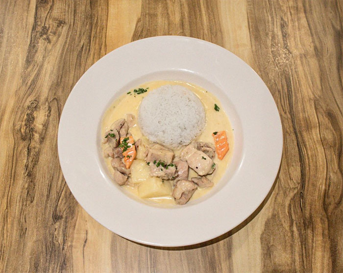 Plate of Chicken Á La King on a table