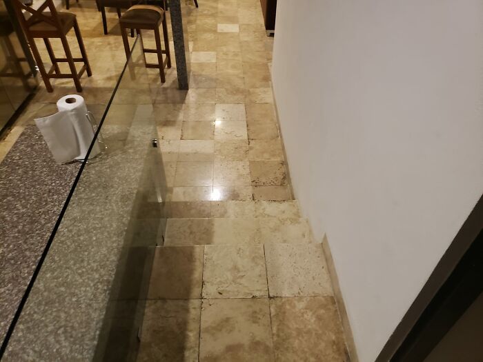 Stairs With Similarly Colored Tiles, No Hand Rail, And A Glass Wall... In A Beach Town Where Our Feet Were Regularly Wet. Almost Died A Few Times