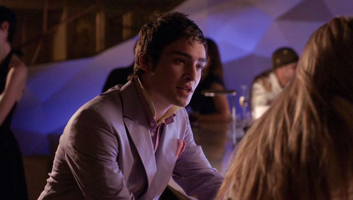 Chuck wearing purple suit 