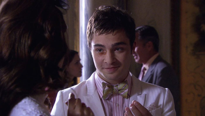 Chuck wearing pink suit 