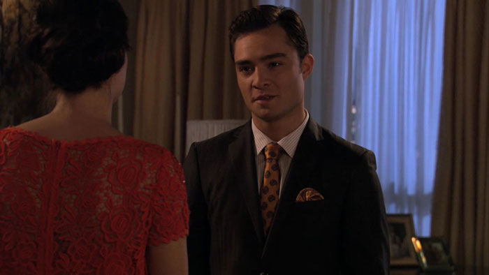 Chuck wearing black suit 