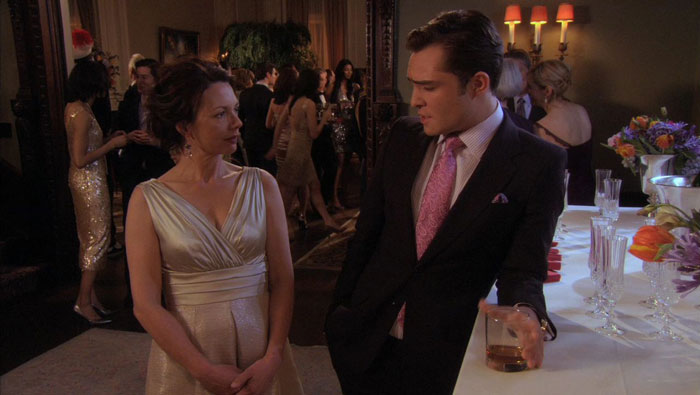 Chuck wearing pink tie 