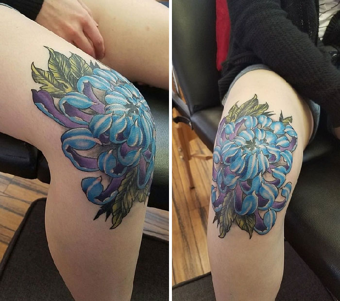 Blue floral knee tattoos with green leaves on both knees, showcasing intricate design details.