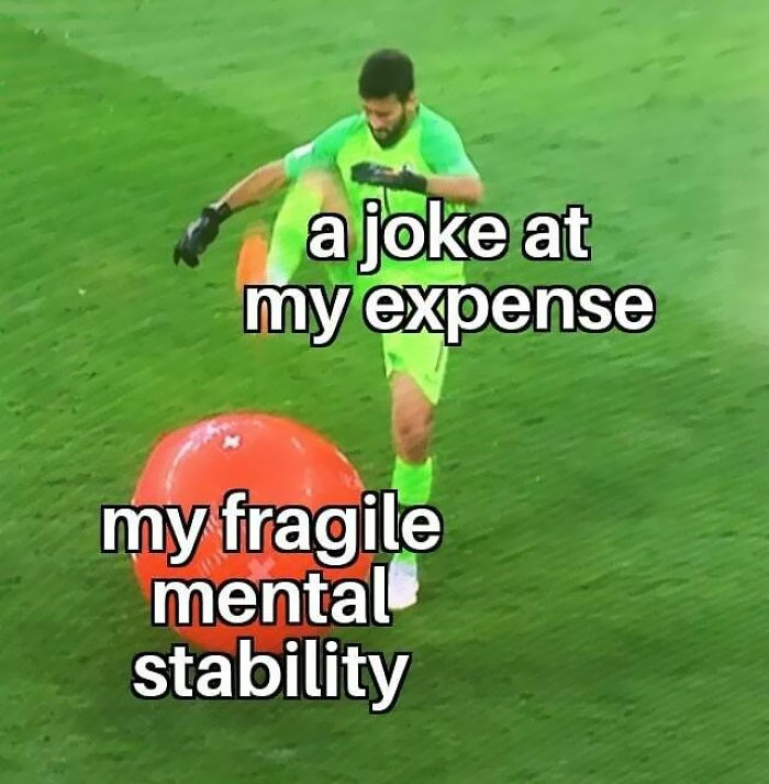 Soccer player kicking a giant ball labeled "my fragile mental stability," humorously depicting mental health struggles.