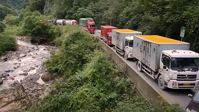 Picture of huge traffic Sichuan-Tibet Highway in China and Tibet