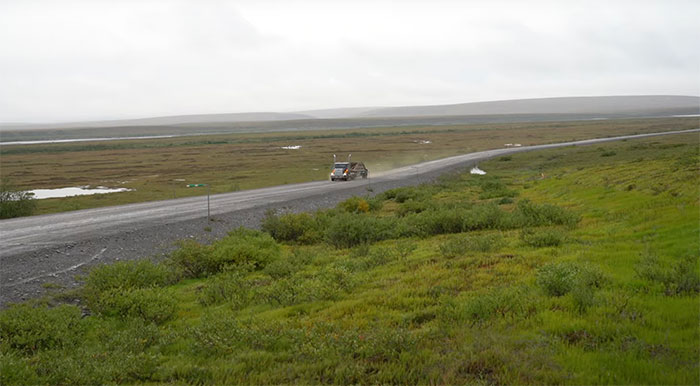 Picture of person driving on James Dalton Highway in Alaska