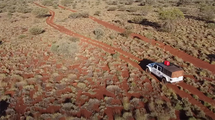 Picture of person driving on Canning Stock Route road in Australia