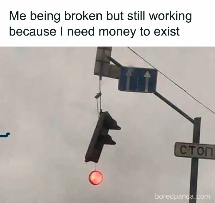 A relatable meme showing a broken traffic light still working with a red light.