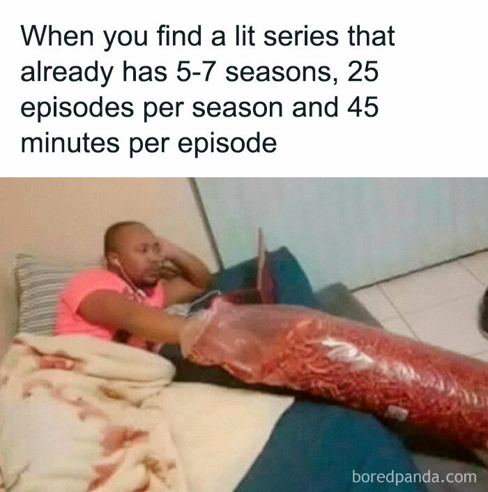 Man relaxing on a couch with snacks, watching TV series; relatable meme humor.