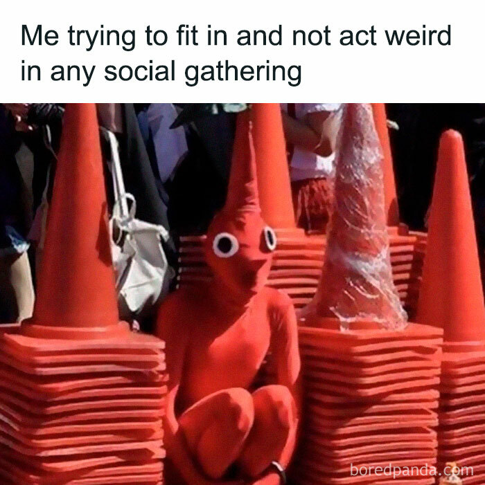 A relatable meme showing a person dressed as a traffic cone trying to blend in at a social gathering.