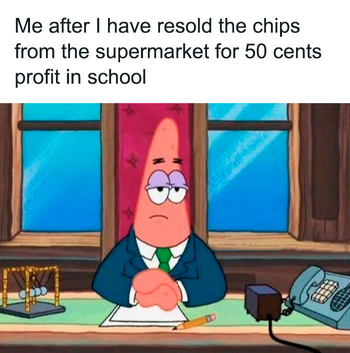A SpongeBob meme featuring Patrick Star sitting at a desk in a suit, looking serious and contemplative. He is depicted as if he is in an office setting, with a Newton's cradle, a pencil, and a telephone in front of him. The text above reads, "Me after I have resold the chips from the supermarket for 50 cents profit in school," humorously illustrating Patrick as a business mogul after a small entrepreneurial success.