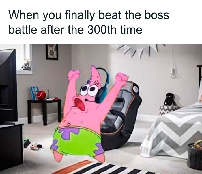 A SpongeBob meme featuring Patrick Star with a gaming headset, cheering with his arms raised in excitement in a modern bedroom setup with a gaming chair and monitor. The text above reads, "When you finally beat the boss battle after the 300th time," capturing the triumphant feeling of finally overcoming a difficult video game challenge after numerous attempts.