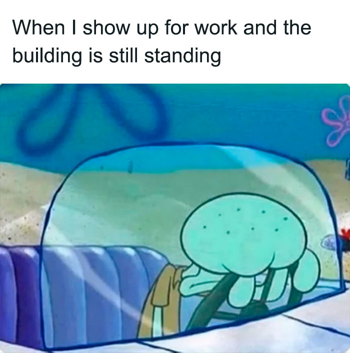 A SpongeBob meme featuring Squidward slumped over the steering wheel of his boat car, looking visibly exhausted and defeated. The text above reads, "When I show up for work and the building is still standing," humorously expressing the feeling of disbelief or mild disappointment that things are still normal and functioning when you arrive at work.