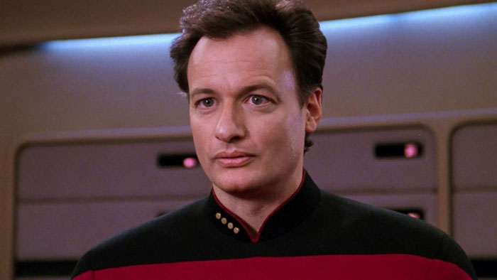 Q looking intensely at something