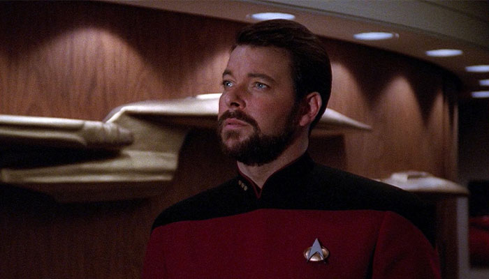 Captain Kirk looking reminiscingly 